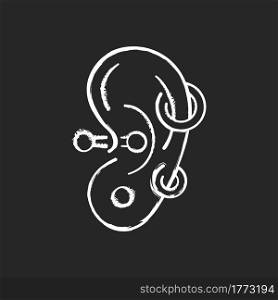 Ear piercing chalk white icon on dark background. Jewellery injected into human ears. Accessories made from valuable materials. Body modifications. Isolated vector chalkboard illustration on black. Ear piercing chalk white icon on dark background