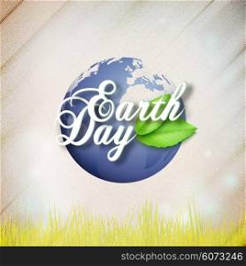 Earth Day background with the words, world globe and green leaves. Wooden texture. Vector illustration.