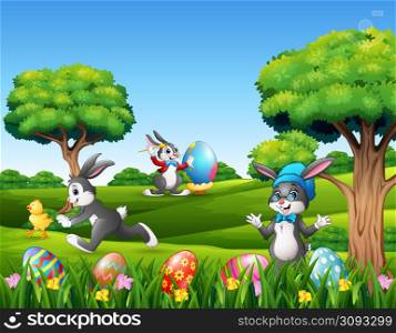 Easter bunnies and easter egg on the nature