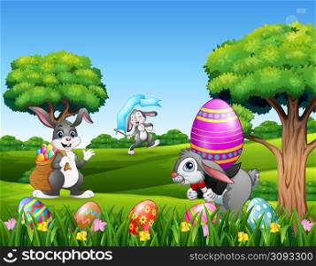 Easter bunnies and easter egg on the nature