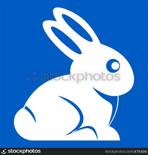 Easter bunny icon white isolated on blue background vector illustration. Easter bunny icon white