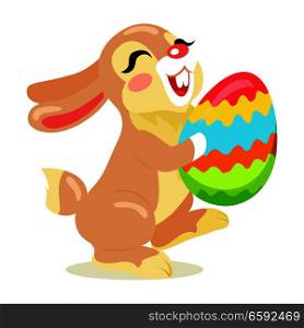 Easter Cheerful Bunny holding painted egg flat design isolated on white. Non-ferrous ball decorated yellow,red,blue,orange and green waves. Vector illustration of funny easter holiday drawn pattern.. Easter Cheerful Bunny Holding Painted Egg Flat