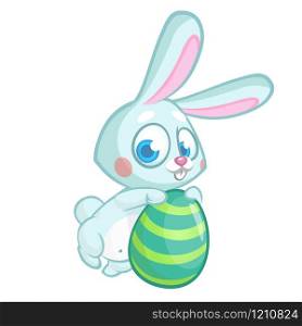 Easter rabbit. Vector bunny holding colorful egg. Isolated on white