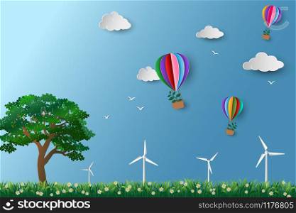 Eco friendly and environment conservation concept,colorful hot air balloon with tree flying over the meadow,paper art design vector illustration