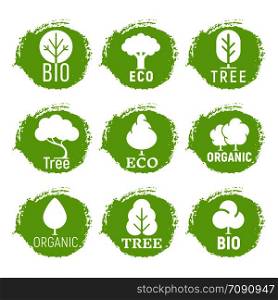 Eco friendly, organic, tree logos on green grunge background. Vector nature ecology symbol of set illustration. Eco friendly, organic, tree logos on green grunge background