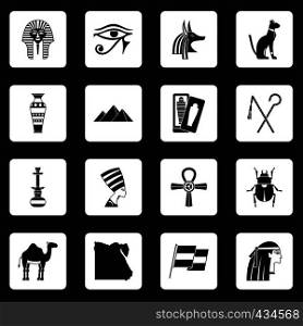 Egypt travel items icons set in white squares on black background simple style vector illustration. Egypt travel items icons set squares vector