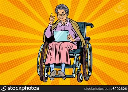 elderly woman disabled person in a wheelchair, gadget tablet. Pop art retro vector illustration. elderly woman disabled person in a wheelchair, gadget tablet