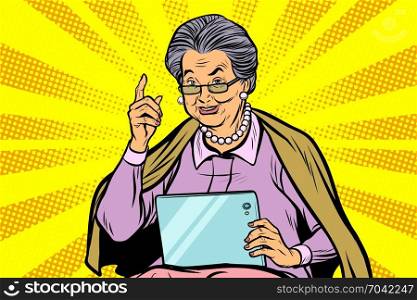elderly woman with a tablet. Pop art retro vector illustration. Caucasian elderly woman with a tablet