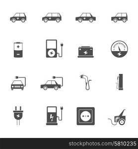 Electric Car Black Icon Set . Electric car transport and charging station with socket and wire flat black icon set isolated vector illustration