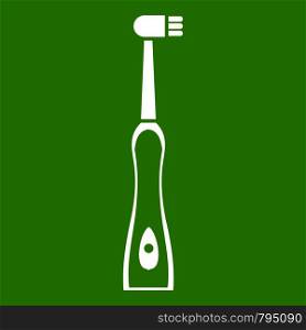 Electric toothbrush icon white isolated on green background. Vector illustration. Electric toothbrush icon green