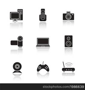 Electronic equipment drop shadow icons set. Digital photo and video cameras. Black cast shadow silhouettes illustrations isolated on white. Computer technology items. Vector infographics elements. Electronic equipment drop shadow icons set.