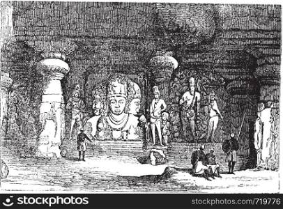 Elephanta Cave in Maharashtra, India, during the 1890s, vintage engraving. Old engraved illustration of an Elephanta Cave showing wall sculptures.