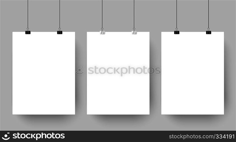 Empty affiche mockup hanging on paper clips. White blank advertising poster template casts shadow on gray background. three canvas photo sheets vector illustration. Empty affiche mockup hanging on paper clips. White blank advertising poster template casts shadow on gray background vector illustration