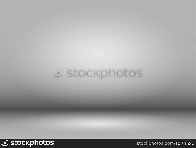 Empty Studio background with gray vignette. The gray background is illuminated by a light source.