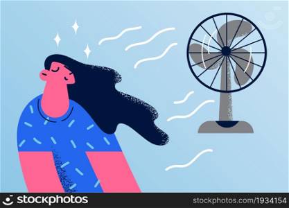 Enjoying cool air from wave concept. Young smiling woman cartoon character with eyes closed sitting on floor catching enjoying cool wind from fan vector illustration . Enjoying cool air from wave concept.