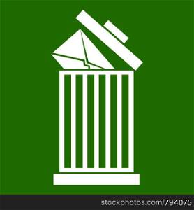 Envelope in trash bin icon white isolated on green background. Vector illustration. Envelope in trash bin icon green
