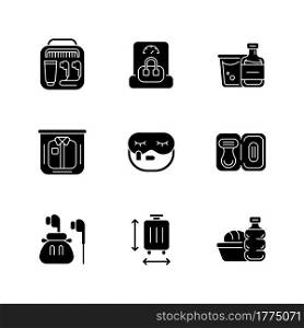 Essential tourist pack for travel black glyph icons set on white space. Packing clothes and compact things. Mini size objects for tourist comfort. Silhouette symbols. Vector isolated illustration. Essential tourist pack for travel black glyph icons set on white space