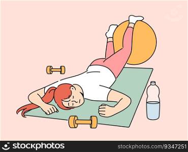 Exhausted woman in fitness room fell asleep on sports yoga mat and needs to rest after workout. Lazy girl sleeps in fitness club, not wanting to do athletics and listen to advice of personal trainer. Exhausted woman in fitness room fell asleep on sports yoga mat and needs to rest after workout