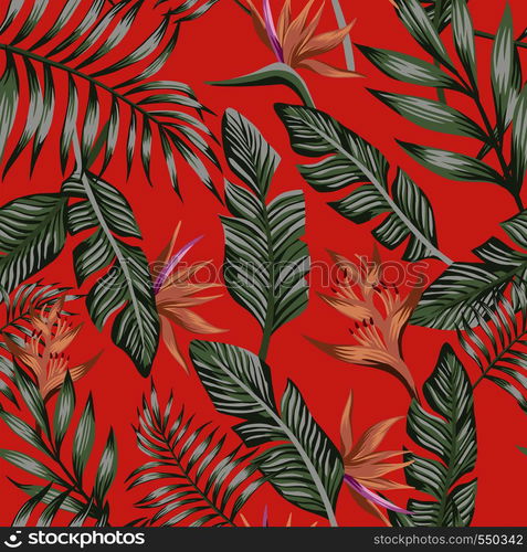 Exotic tropical green palm leaves brown tropical flowers bird of paradise (strelizia) seamless vector pattern trendy living coral background