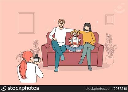 Family photosession and lifestyle concept. Woman photographer standing taking photo of young happy family with daughter sitting on coach smiling vector illustration. Family photosession and lifestyle concept.