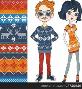 fashion hipster boy and girl in knitted sweaters with Norwegian seamless pattern