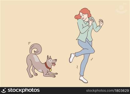 Fear of dogs animals concept. Young stressed girl feeling afraid running away from friendly playing dog outdoors vector illustration . Fear of dogs animals concept