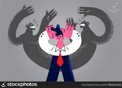 Feeling panic and Inner fears concept. Young stressed frustrated businessman cartoon character standing feeling chocked with afraid shadows around vector illustration . Feeling panic and Inner fears concept