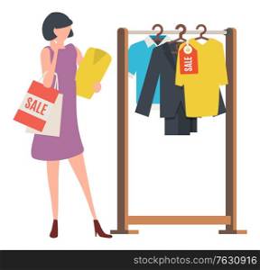 Female character choosing clothes, woman standing with package sale and blouse. T-shirt and suit on hanger, shopper in store, shopping in sale season. Vector illustration in flat cartoon style. Choosing Clothes, Woman Shopping, Store Vector