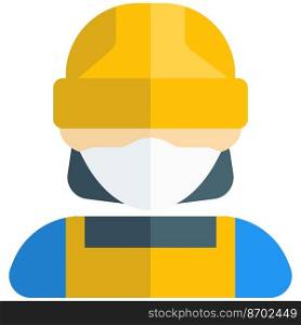 Female constructor in mask and helmet for precaution.