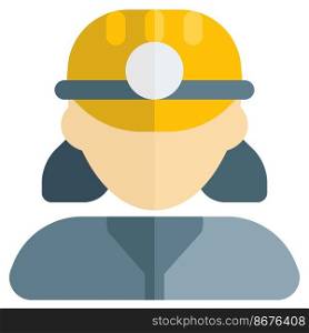 Female miner wearing safety helmet with head lamp