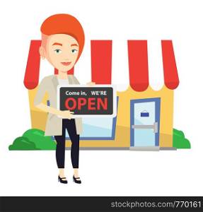 Female shop owner holding open signboard. Cheerful female shop owner standing in front of small store. Woman inviting to come in her shop. Vector flat design illustration isolated on white background.. Female shop owner holding open signboard.