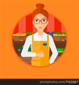 Female supermarket worker giving thumb up while standing on the background of shelves with vegetables and fruits in supermarket. Vector flat design illustration in the circle isolated on background.. Friendly supermarket worker.