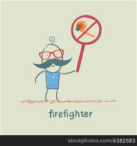 firefighter holding the sign ban on burning stick