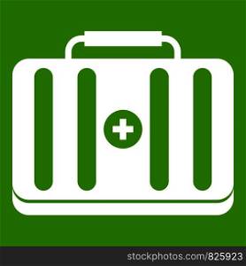 First aid kit icon white isolated on green background. Vector illustration. First aid kit icon green