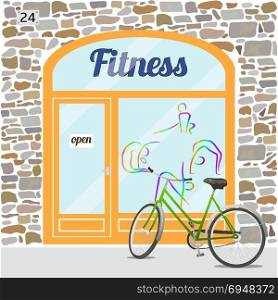 Fitness club building. Fitness club building. Facade of stone. Fitness logo on the window. Bike at the fore. EPS10