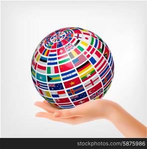 Flags of the world on a globe, held in hand. Vector illustration