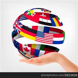 Flags of the world on a globe, held in hand. Vector illustration.