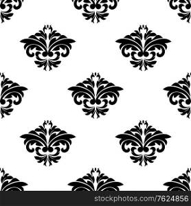 Floral arabesque motifs in a repeat black and white seamless damask pattern suitable for wallpaper, tiles and textile design. Floral motifs in a repeat seamless damask pattern