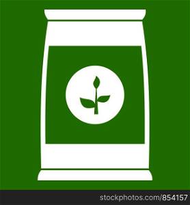 Flower seeds in package icon white isolated on green background. Vector illustration. Flower seeds in package icon green