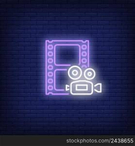 Footage neon sign. Luminous signboard with camera and filmstrip. Night bright advertisement. Vector illustration in neon style for filmmaking, blogging, production, editing