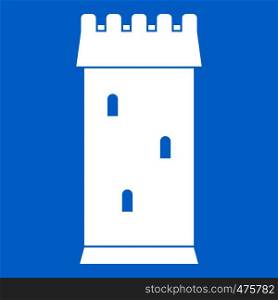 Fortress tower icon white isolated on blue background vector illustration. Fortress tower icon white