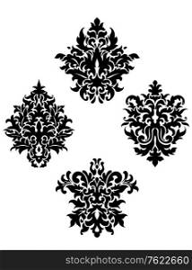 Four different black and white foliate arabesque motifs arranged in a diamond pattern on a white background