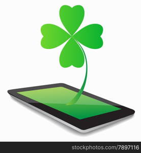 Four- leaf clover - Irish shamrock St Patrick&rsquo;s Day symbol. Useful for your design. Green glass clover on white background.Stylish abstract St. Patrick&rsquo;s day leaf clover whit tablet computer.