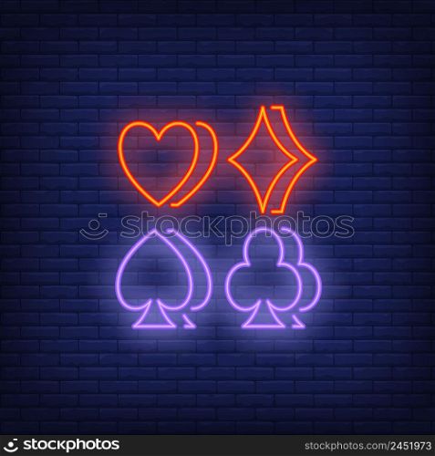 Four suit symbols neon sign. Gambling and poker club design. Night bright neon sign, colorful billboard, light banner. Vector illustration in neon style.