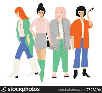Four young women in autumn clothes standing and walking. Isolated on white. Flat vector illustration