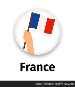 France flag in hand, round icon with shadow isolated on white. Human hand holding flag. France flag in hand, round icon