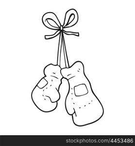 freehand drawn black and white cartoon boxing gloves