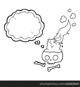 freehand drawn thought bubble cartoon burning candle on skull