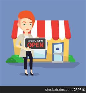 Friendly female shop owner holding open signboard. Cheerful female shop owner standing in front of small store. Woman inviting to come in her shop. Vector flat design illustration. Square layout.. Female shop owner holding open signboard.