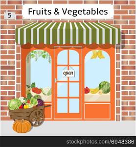 Fruits and vegetables shop. Local fruit and vegetables store building. Cart with vegetables at the fore. Vector illustration. EPS 10.